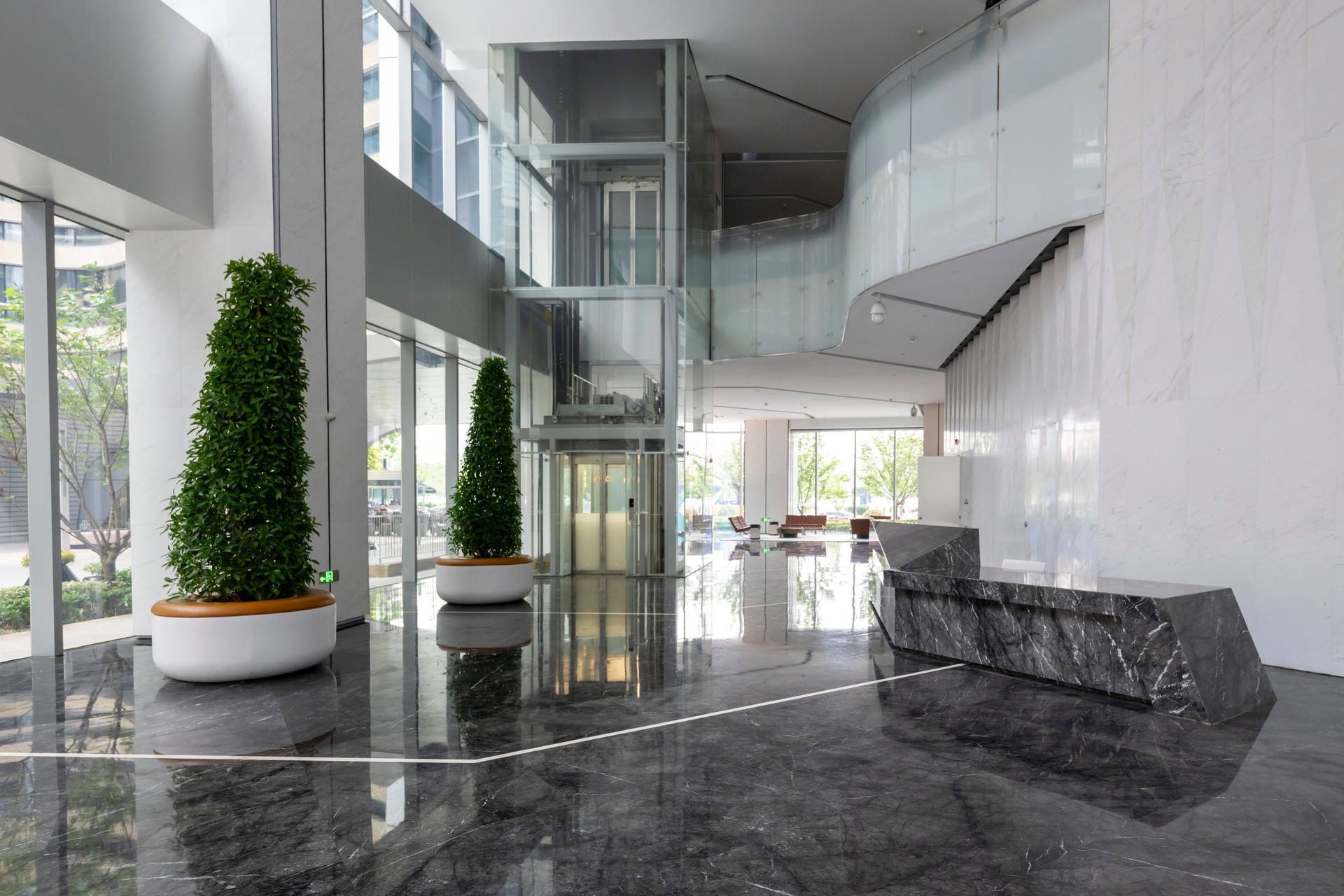 Marble floor in seating area at reception desk of office building